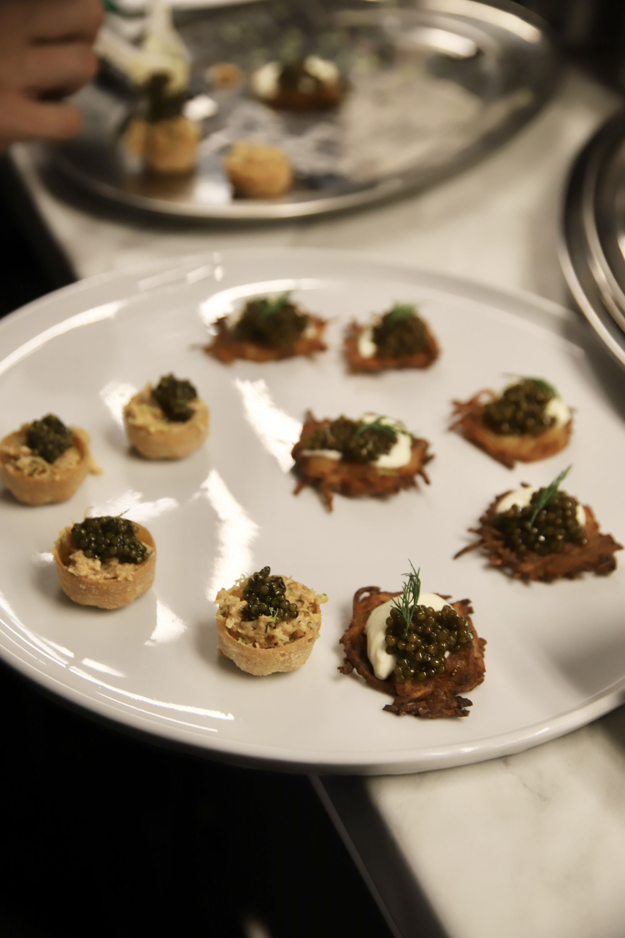 A tray of canapés ready to leave the kitchen.